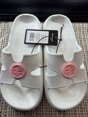 bebe White Slide Sandals with Pink Logo Medallion